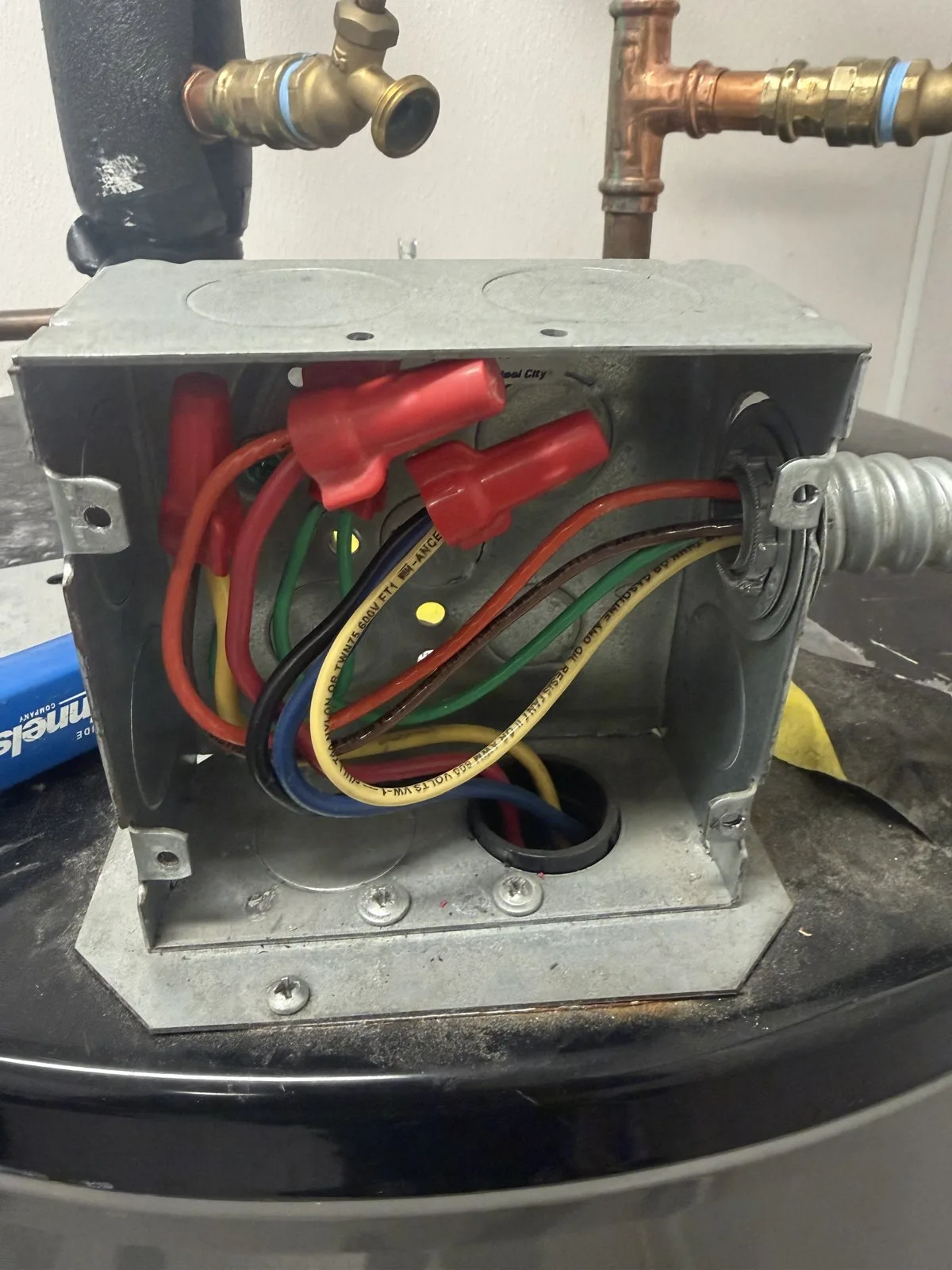 480-volt Rheem replaced with A.O. Smith DEN-52 at Montclair medical building, photo 3 of 9